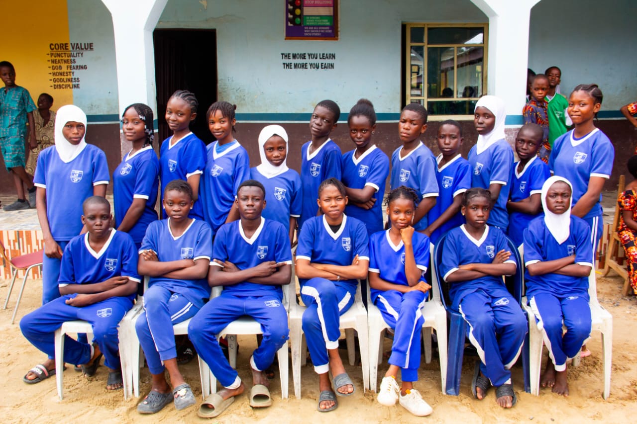 Academy students in blue sports uniforms